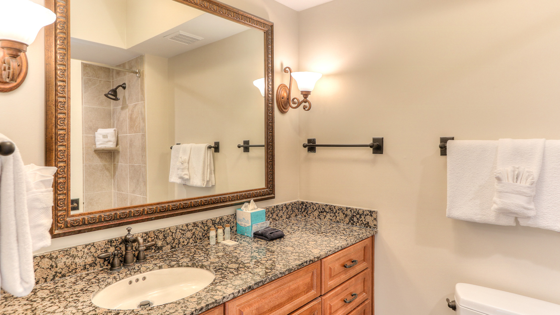 a bathroom with a mirror and sink