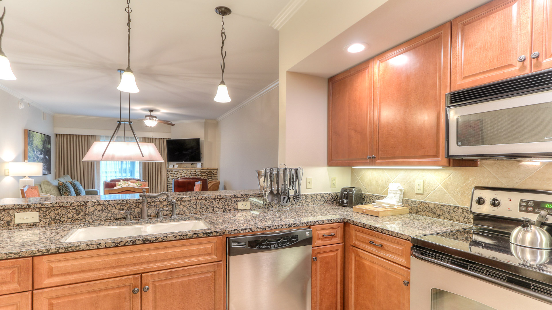 a kitchen with granite counter tops and granite counter tops