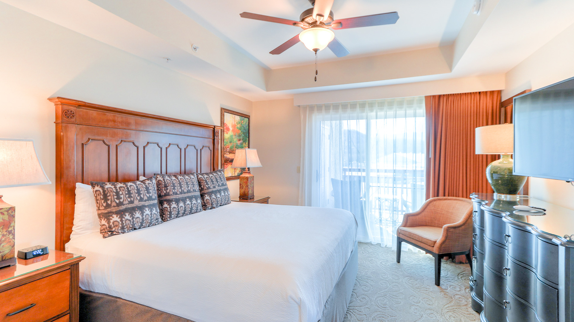a bedroom with a bed and a chair