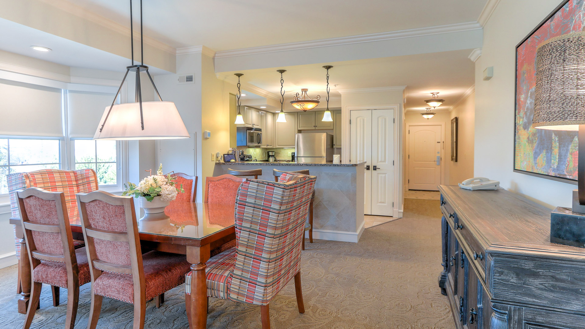 a dining table and chairs in a house