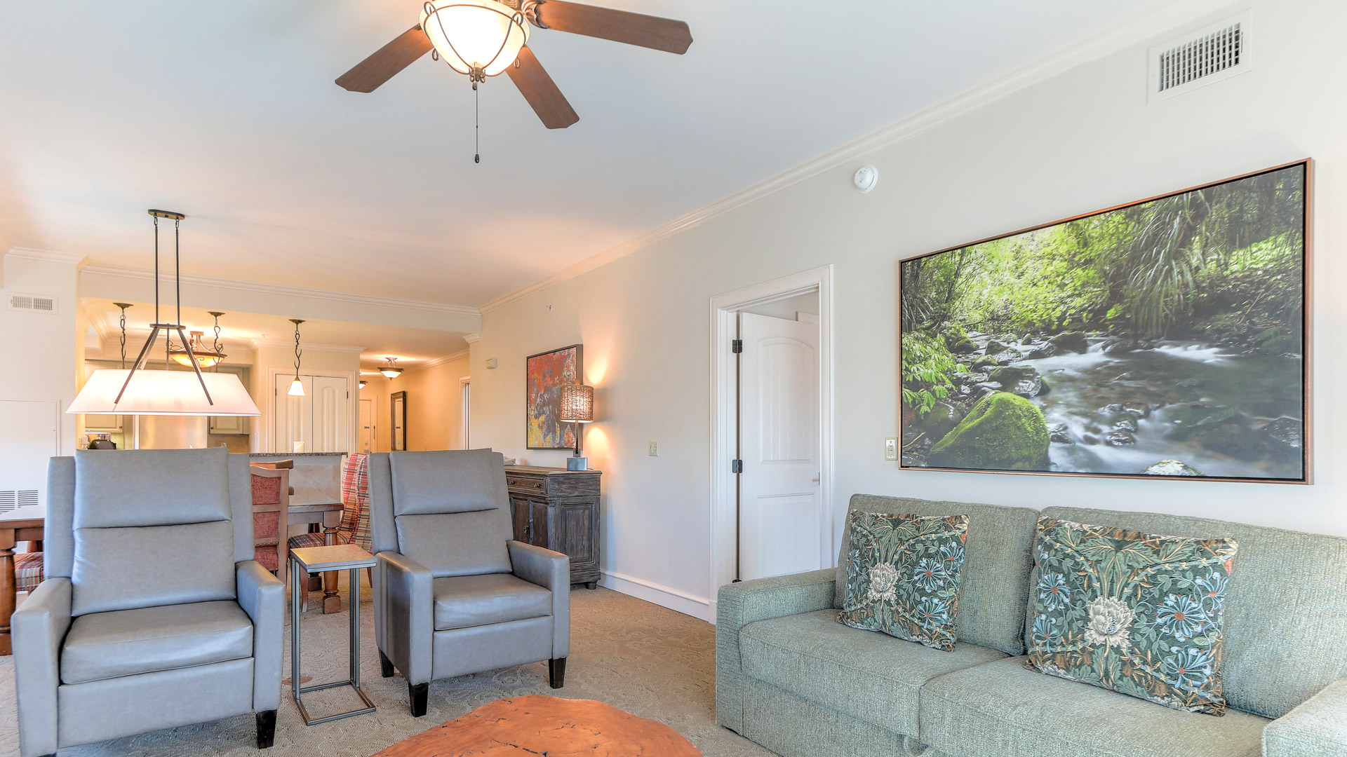 a living room with a couch and a table