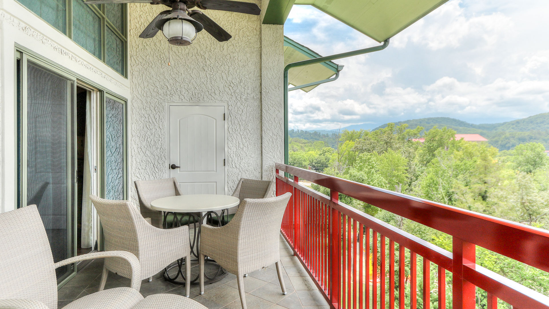a patio with a table and chairs