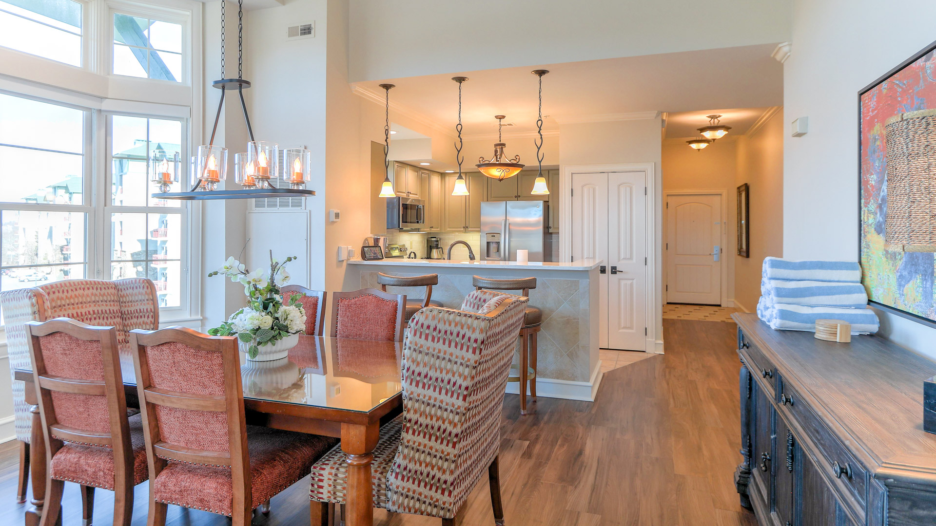 a dining table and kitchen in a house