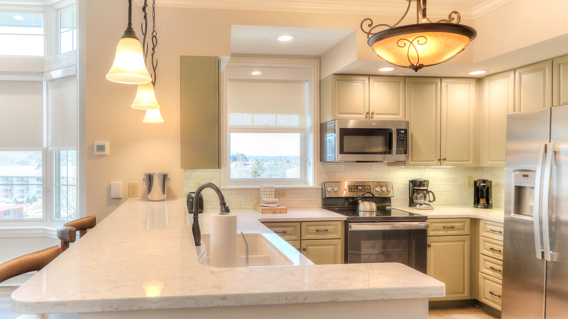 a kitchen with a large island and a sink