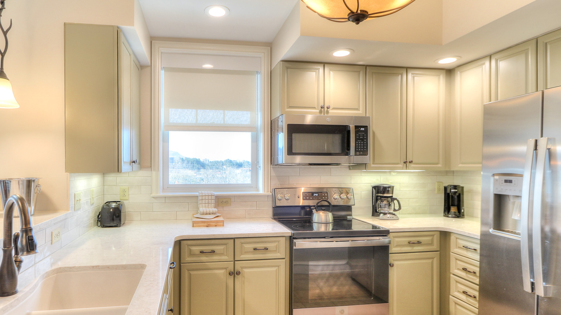 a kitchen with a light fixture
