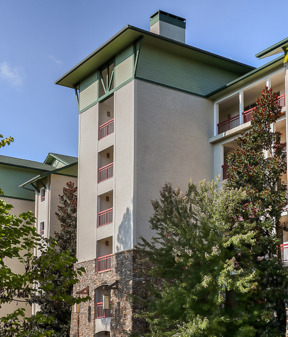 a building with trees around it