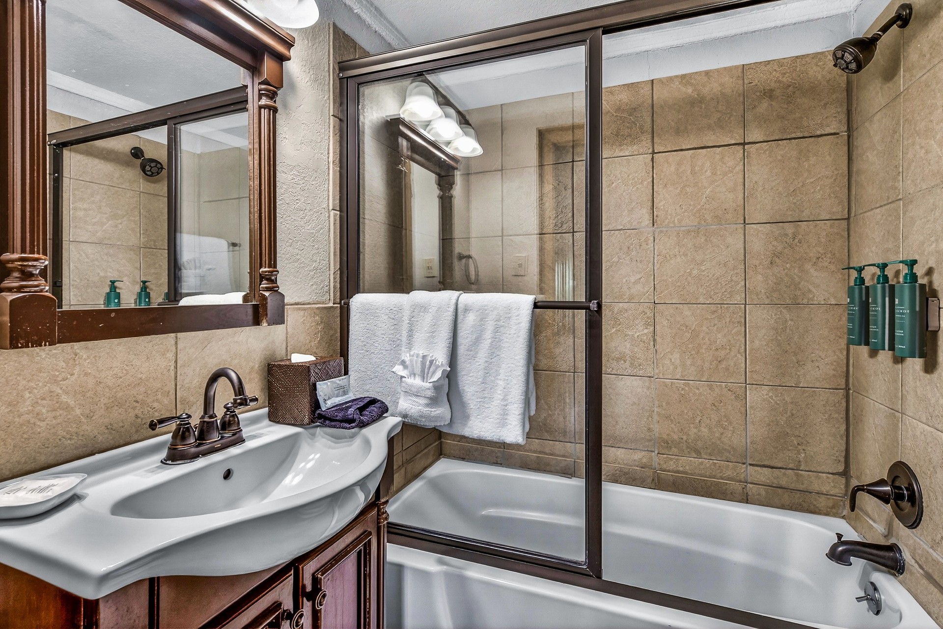 a bathroom with a shower and a sink