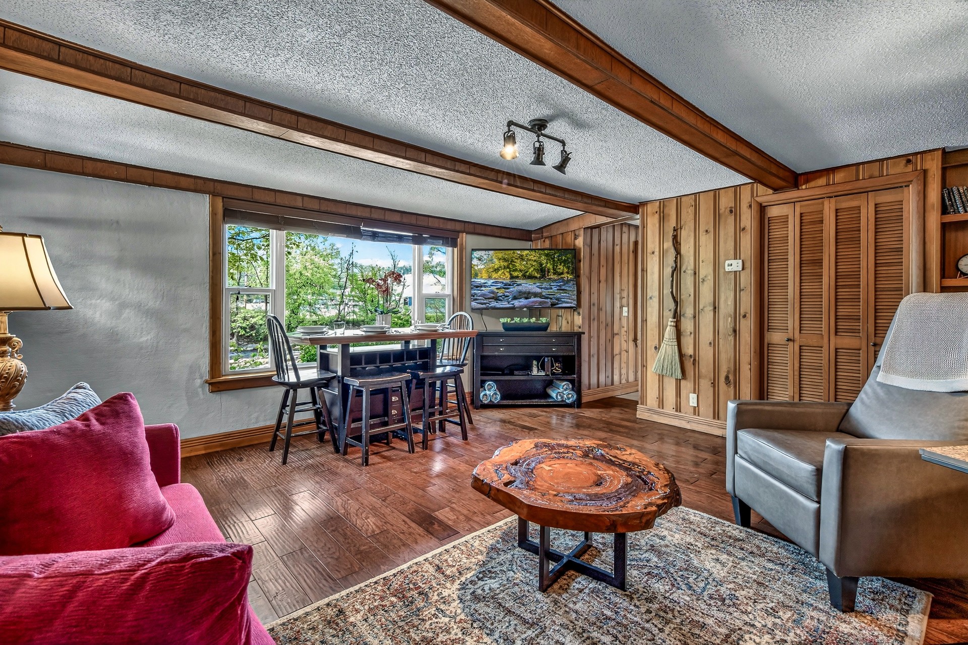 a living room with a couch and a table