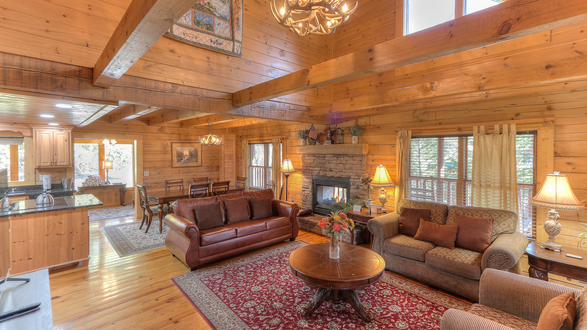 a living room with a fireplace and couches