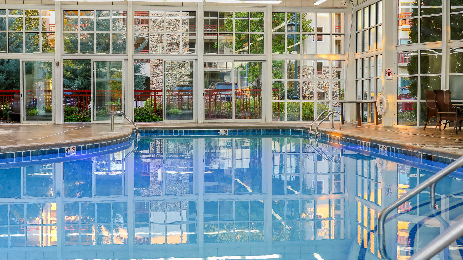 a swimming pool with a large window