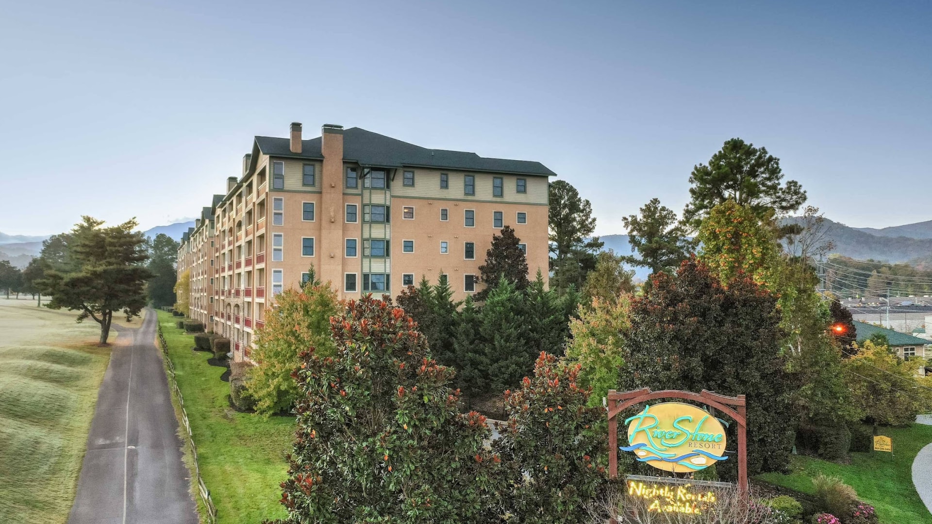 a large building with trees around it