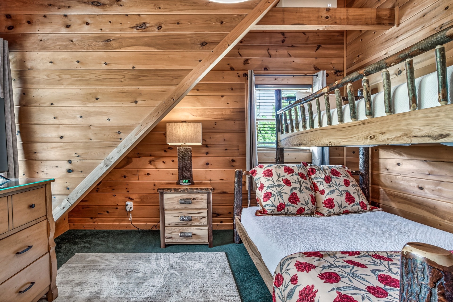 a bedroom with a wood wall and a bed