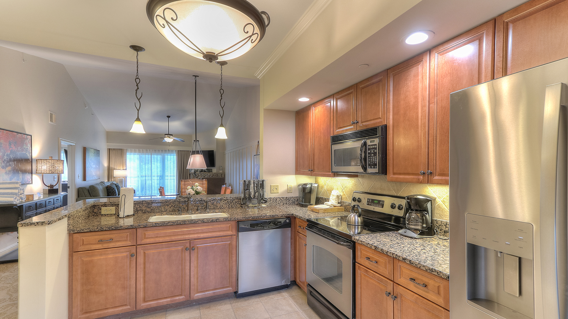 a kitchen with granite counter tops and granite counter tops