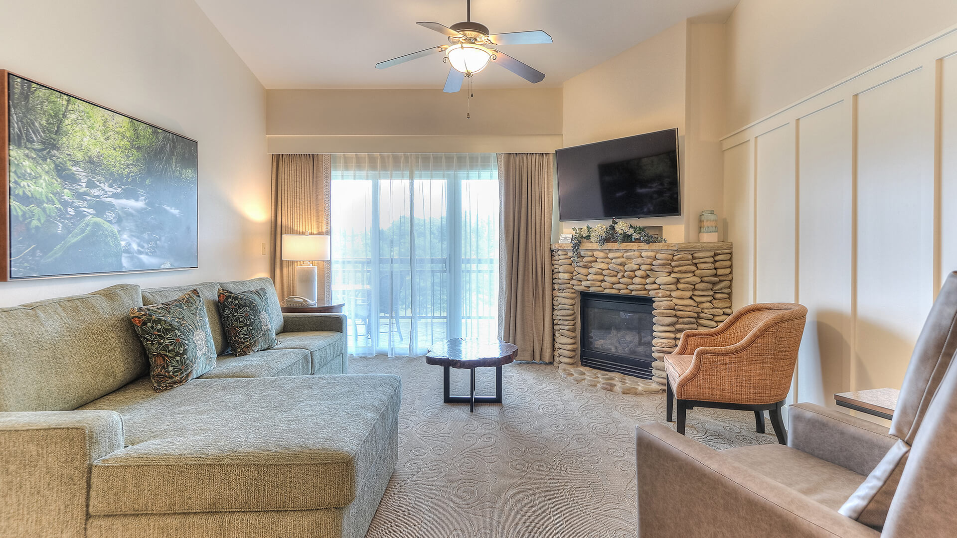 a living room with a fireplace and couches