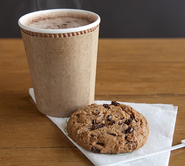 a cup of hot chocolate and a cookie