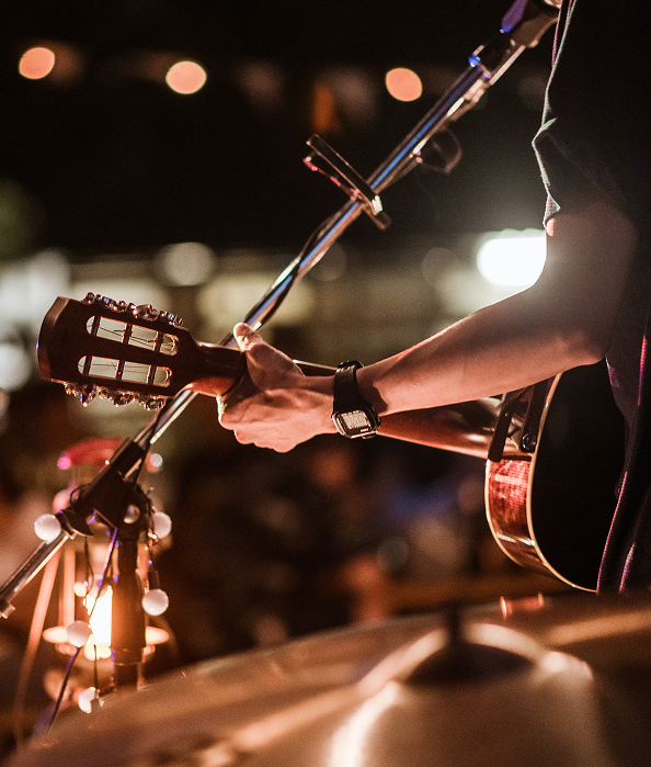 a person playing a guitar