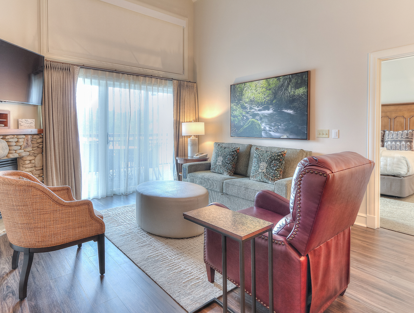 a living room with a couch and a tv