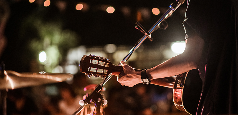 a person playing a guitar