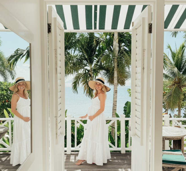 two women standing on a deck