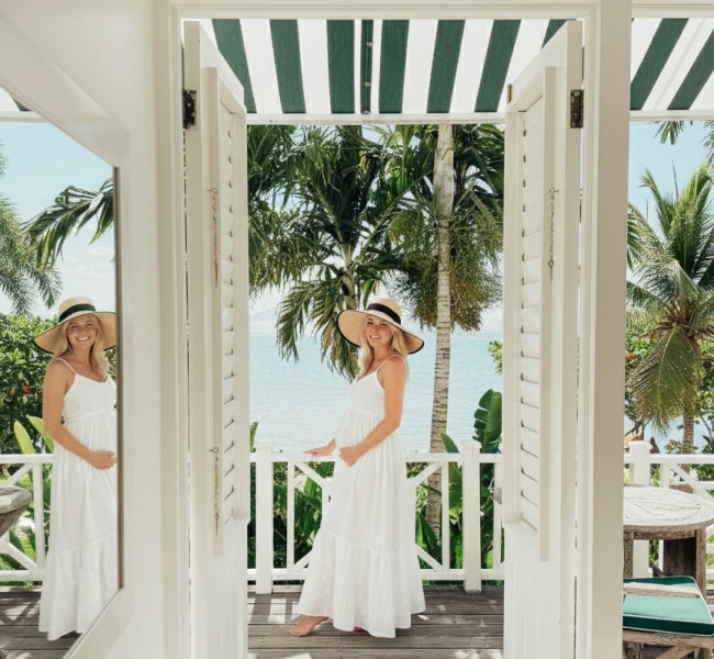 two women standing on a deck