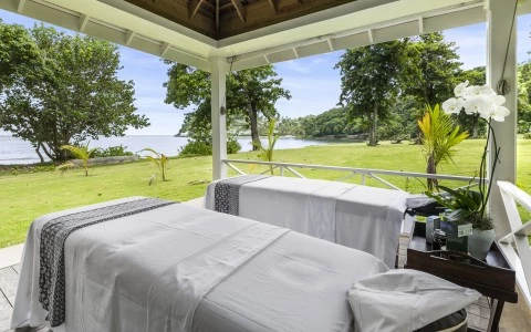 a massage table on a porch