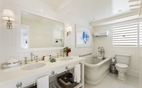 a bathroom with a tub and sink