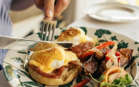 a person eating a plate of food