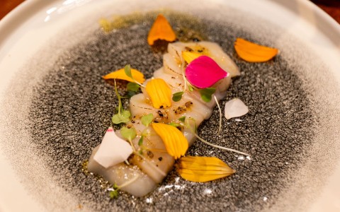 a plate of food with flowers
