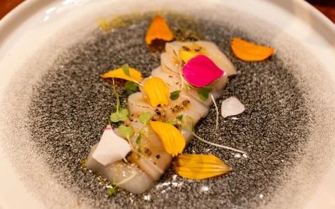 a plate of food with flowers