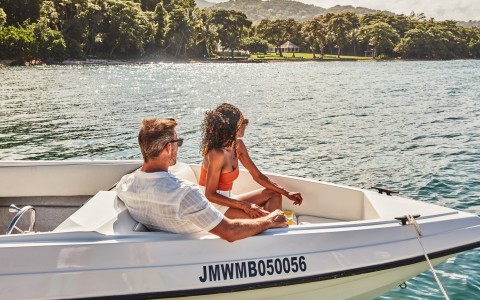 a man and woman in a boat