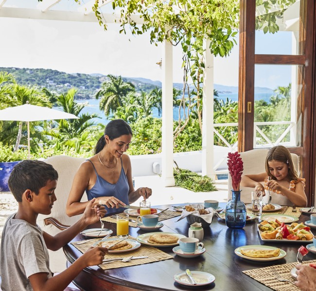 a group of people eating at a table