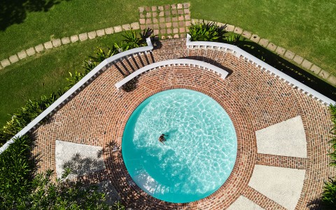 a person swimming in a pool