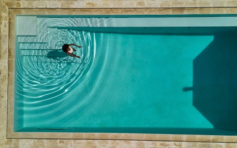 a person in a pool
