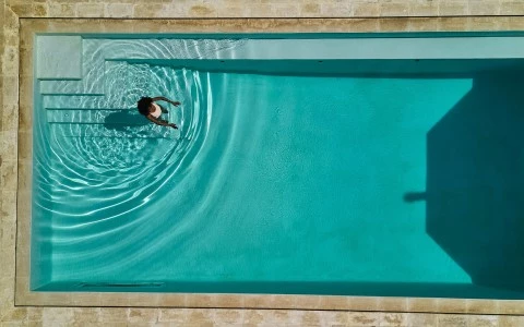 a person in a pool