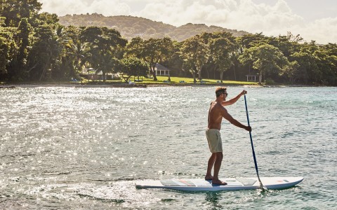 a man on a paddle board