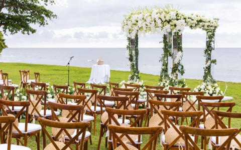 a group of chairs in a wedding setting