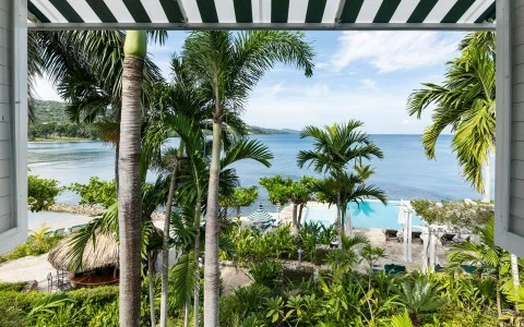 a view of a beach from a deck