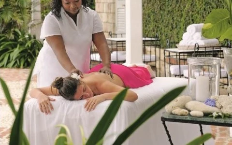 a woman receiving a back massage