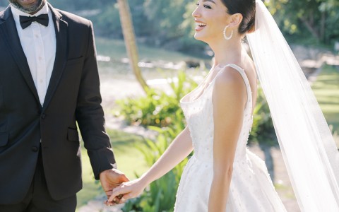 a man and woman holding hands