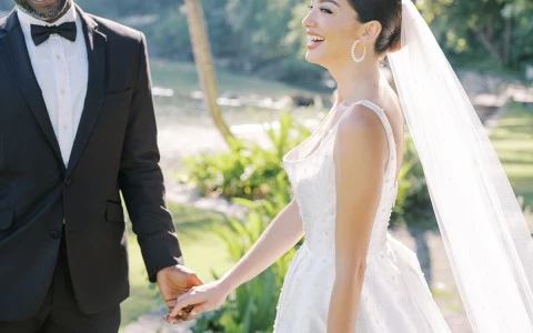 a man and woman holding hands