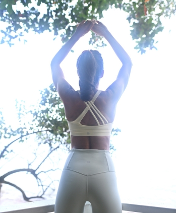a woman in white sports outfit