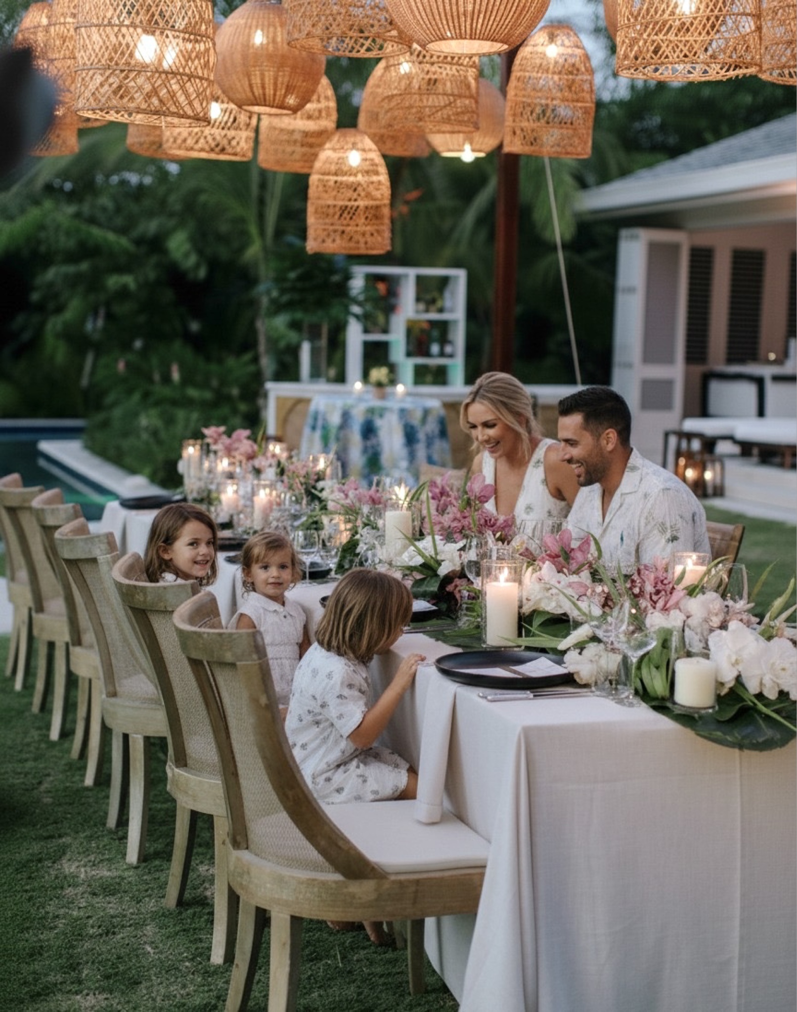a group of people sitting at a table