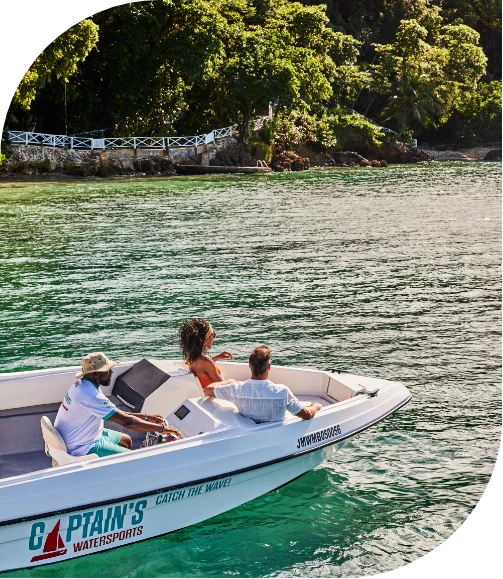 a group of people in a boat on water
