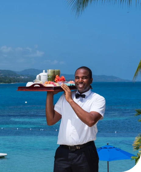 a man holding a tray of food