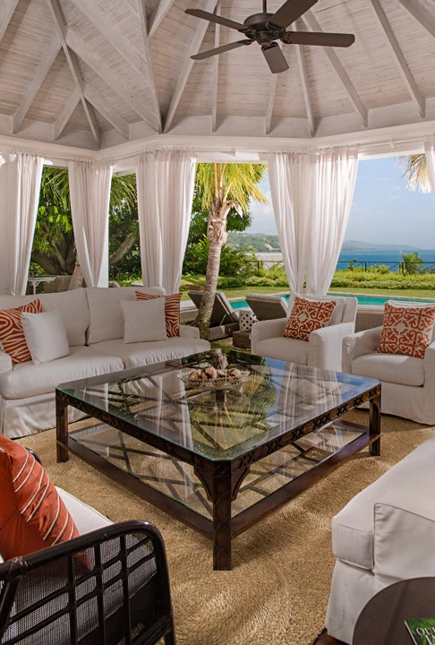 General view of a tropical social area next to the pool