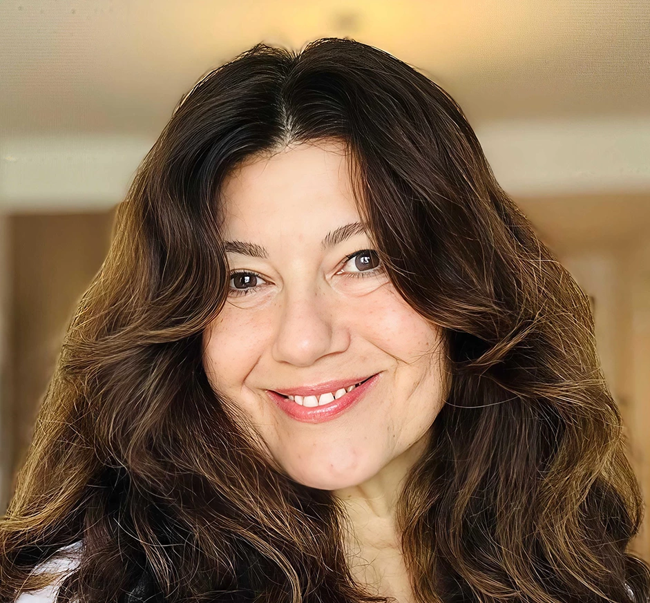 a woman smiling at the camera