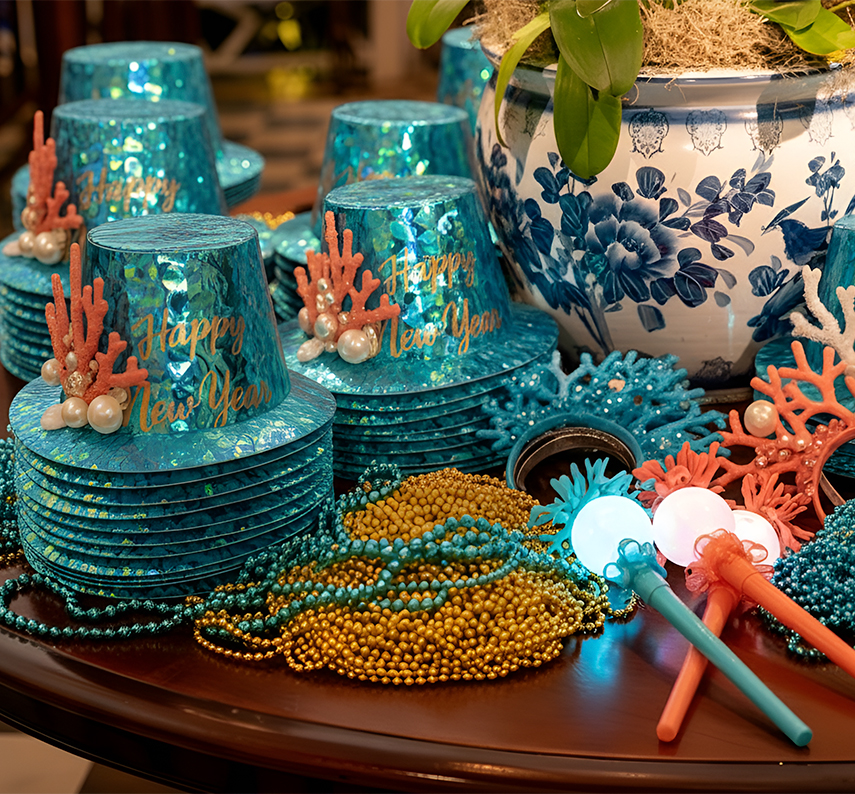 a table with blue hats and beads