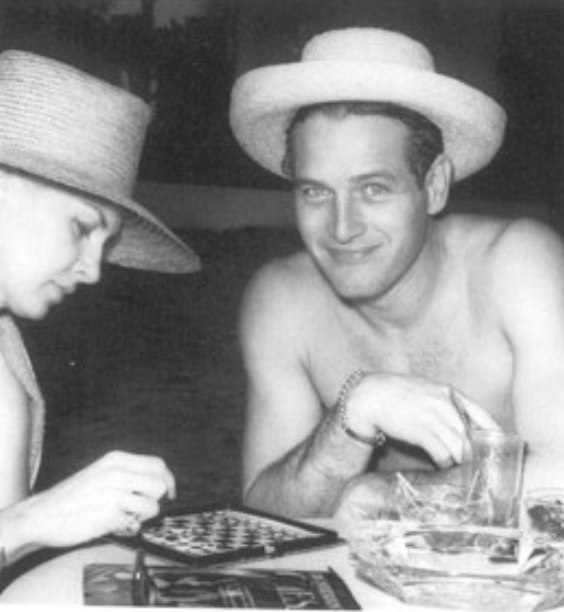 a man and woman playing chess