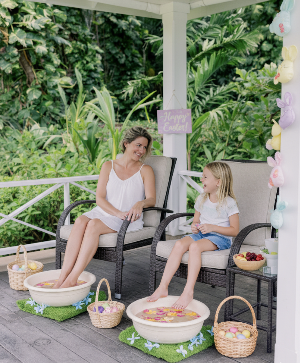 a woman and a girl sitting on chairs with baskets of eggs