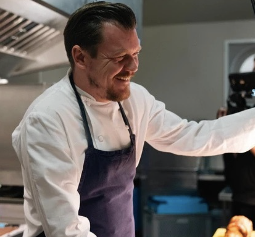 a man in a chef's uniform